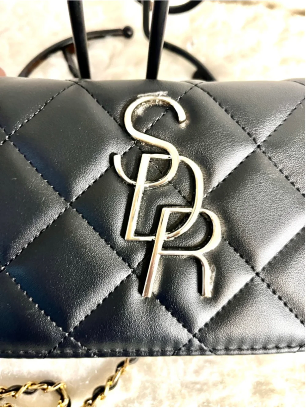 Sergio Di Rossetti SDR quilted crossbody bag with silver hardware